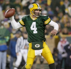 Brett Favre in football gear, ready to throw the ball during a game