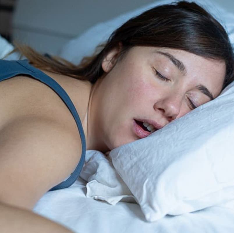 Woman sleeping with mouth open
